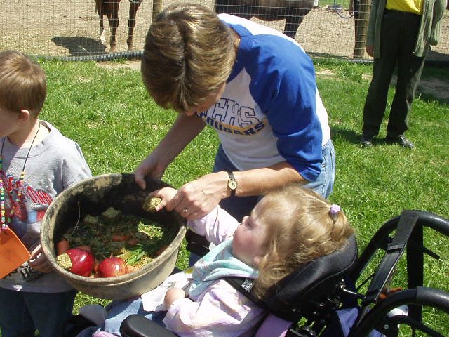 Mary helped make a snack for the neigh-neighs :)
