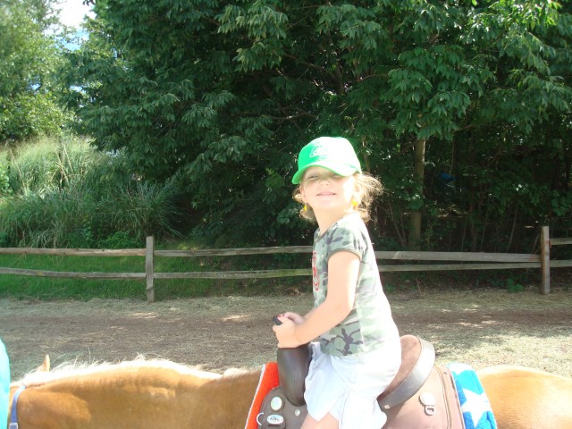 Abby had a blast on the ponies.